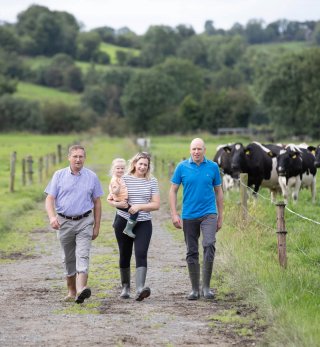 Lakeland Dairies milk supplier Alan Clarke with his family on their farm.