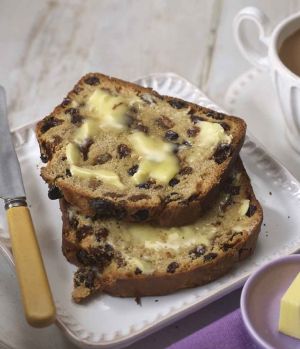 Two slices of barmbrack fruit toast with Lakeland Dairies butter spread on top