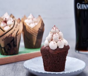 A chocolate muffin made with Irish stout and Lakeland Dairies products, placed on a plate