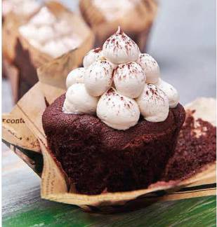 A chocolate muffin made with Irish stout and Lakeland Dairies products, placed on a plate