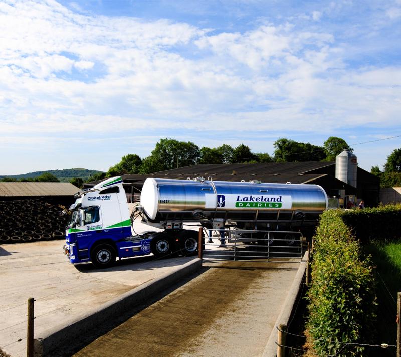 A Lakeland Dairies milk tanker collecting milk from the farm of a milk supplier.