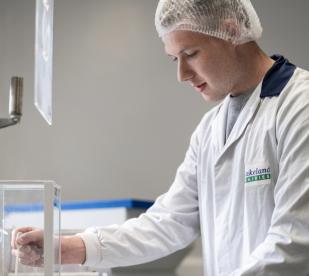 A Lakeland Dairies lab worker doing some tests.