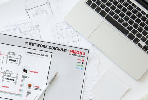 pen and papers with a laptop keyboard