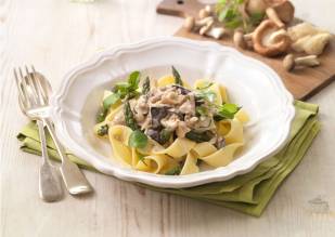 Bowl of pappardelle pasta made with Lakeland Dairies products