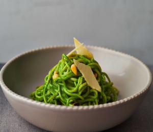 Pesto pasta served in a bowl, made with Lakeland Dairies products