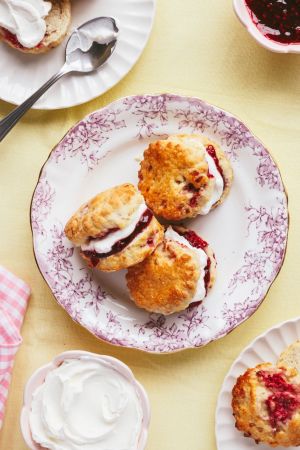 Mini scones with cream and raspberry jam, made with Lakeland Dairies butter