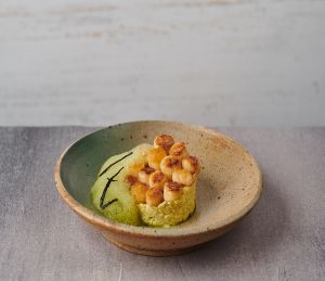 Scallops on a bed of flavoured rice, made with our Lakeland Dairies products