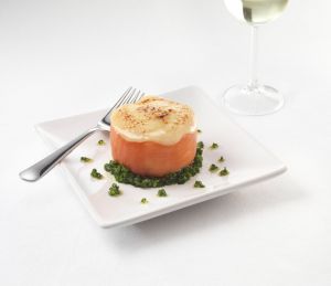 Scrambled egg and smoke salmon rarebit served on a plate, made with Lakeland Dairies products