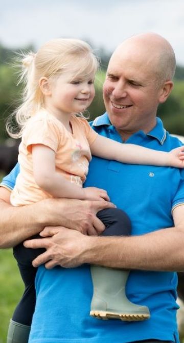 Lakeland Dairies milk supplier Alan Clarke and his daughter.